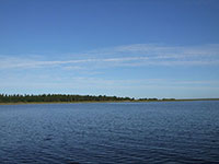 Остров Спасский на озере Воже, где раньше располагался Вожеозерский (Чарондский) монастырь. Ныне остров безлюден. Монастырские постройки не сохранились