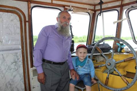 Алексей Романенко с внуком Романом